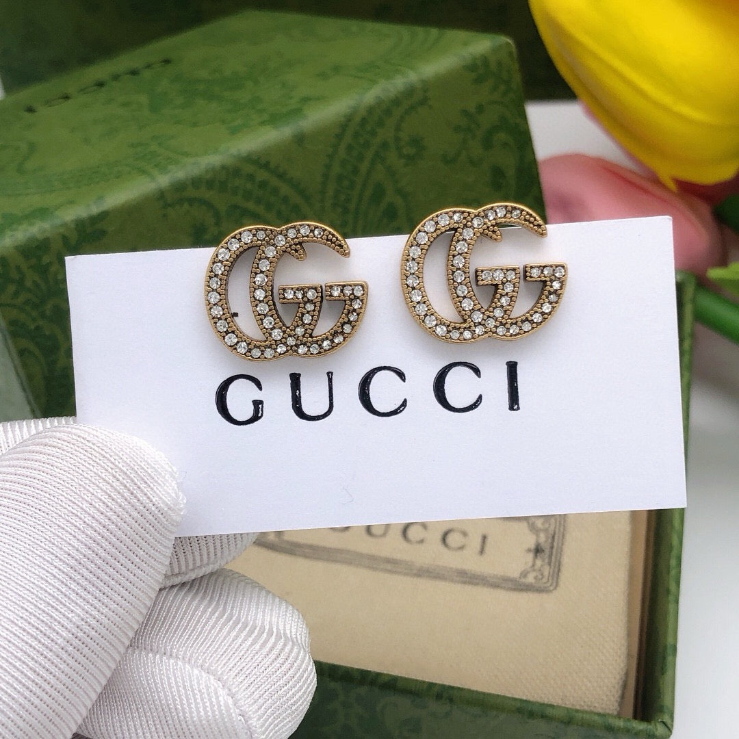 Double-G Emblem Stud Earrings in Polished Metal-Tone – Design 021 main product view