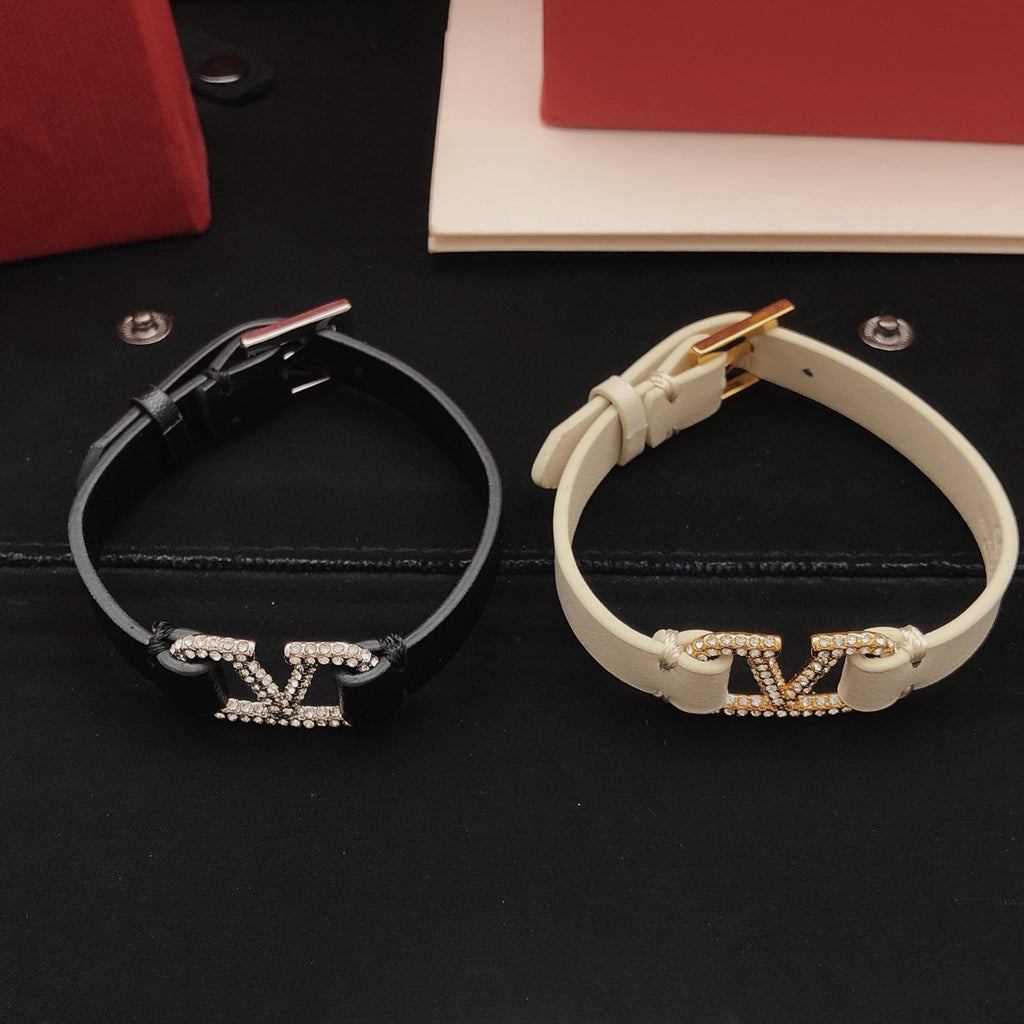 Signature Emblem Bracelet in Gold-Tone – Black front view