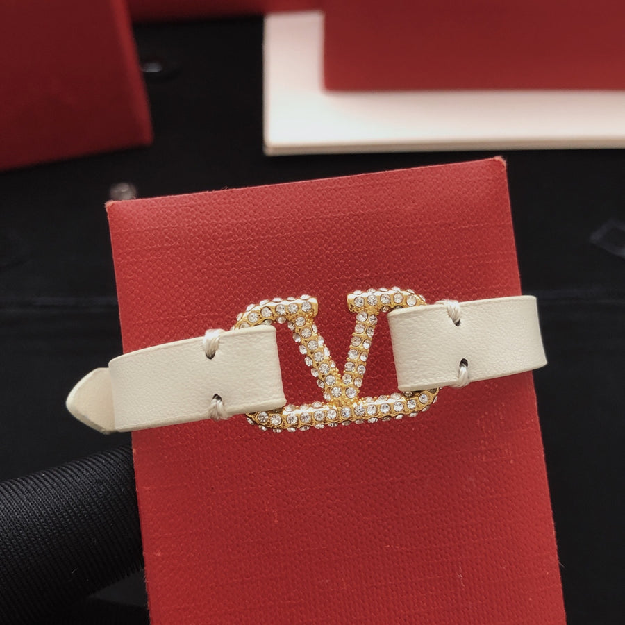 Signature Emblem Bracelet in Gold-Tone – White main product view