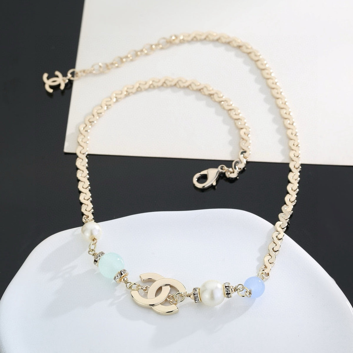 Double-C Emblem Bracelet in Polished Metal-Tone – Design 008 close-up detail