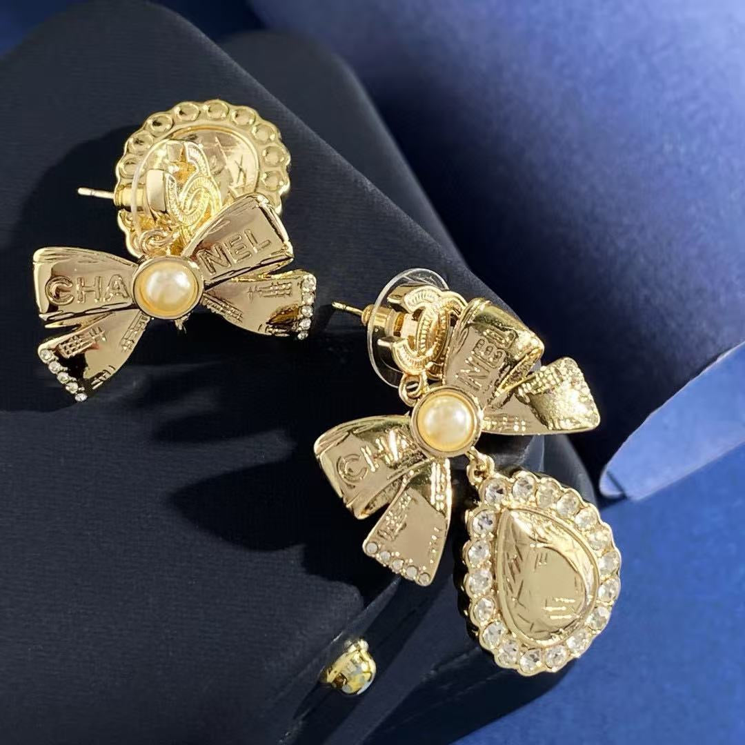 Double-C Emblem Stud Earrings in Gold-Tone – Design 014 styled product view
