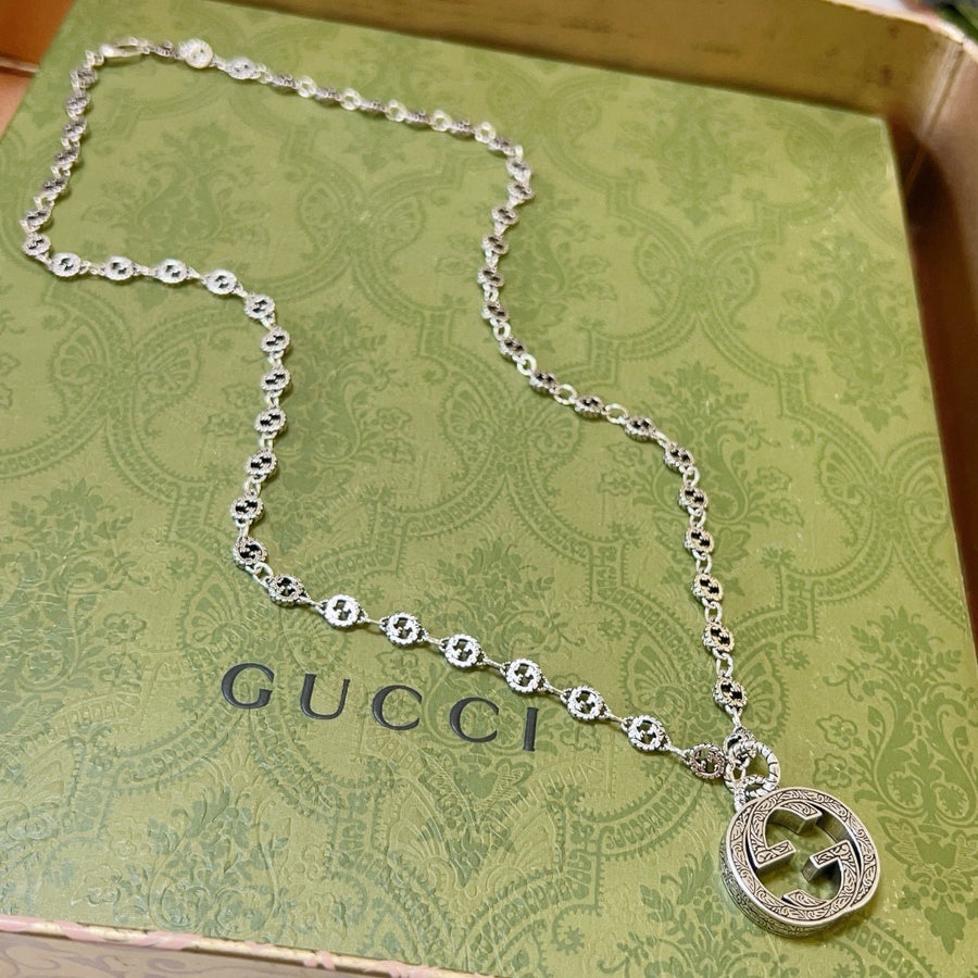 Double-G Emblem Pendant Necklace in Polished Metal-Tone – Vintage Detail – Design 056 main product view