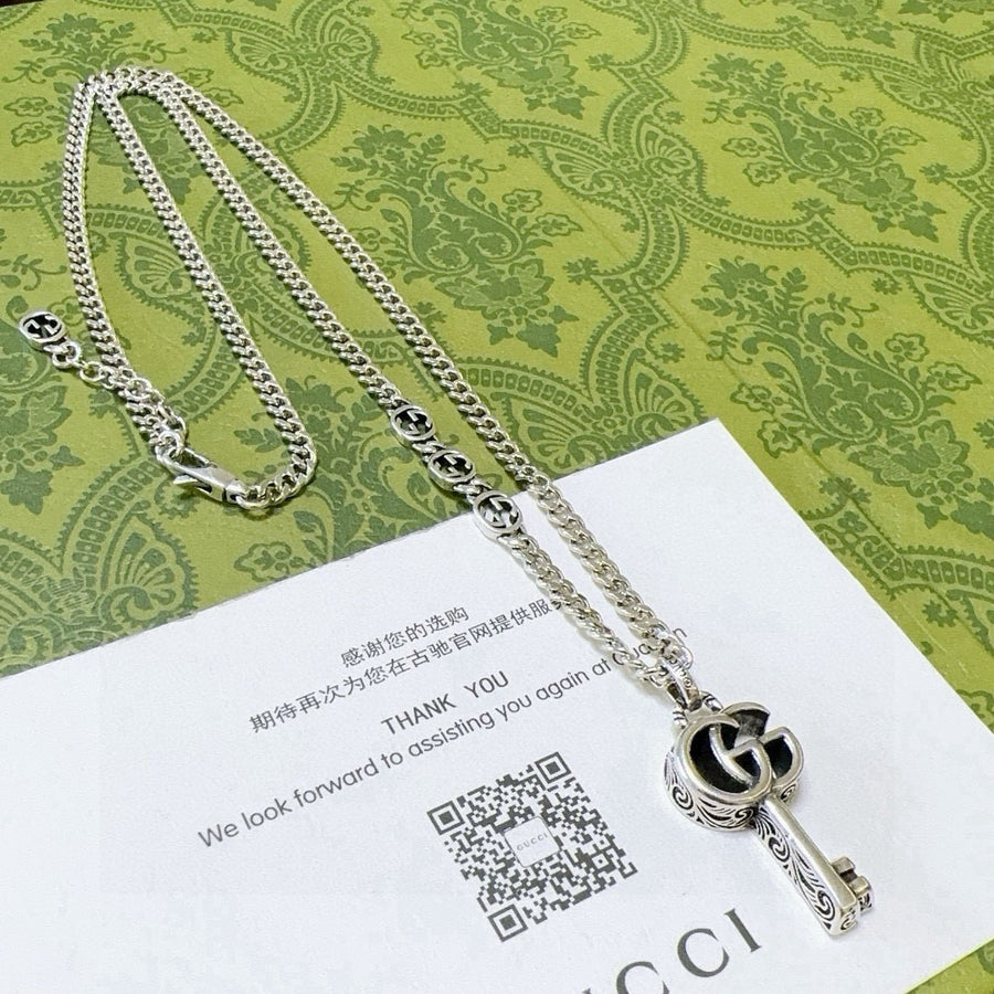 Double-G Emblem Pendant Necklace in Polished Metal-Tone – Vintage Detail – Design 058 main product view