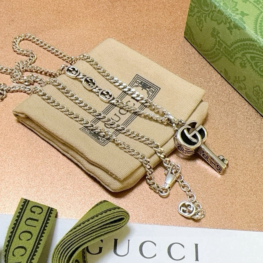 Double-G Emblem Pendant Necklace in Polished Metal-Tone – Vintage Detail – Design 055 front product view