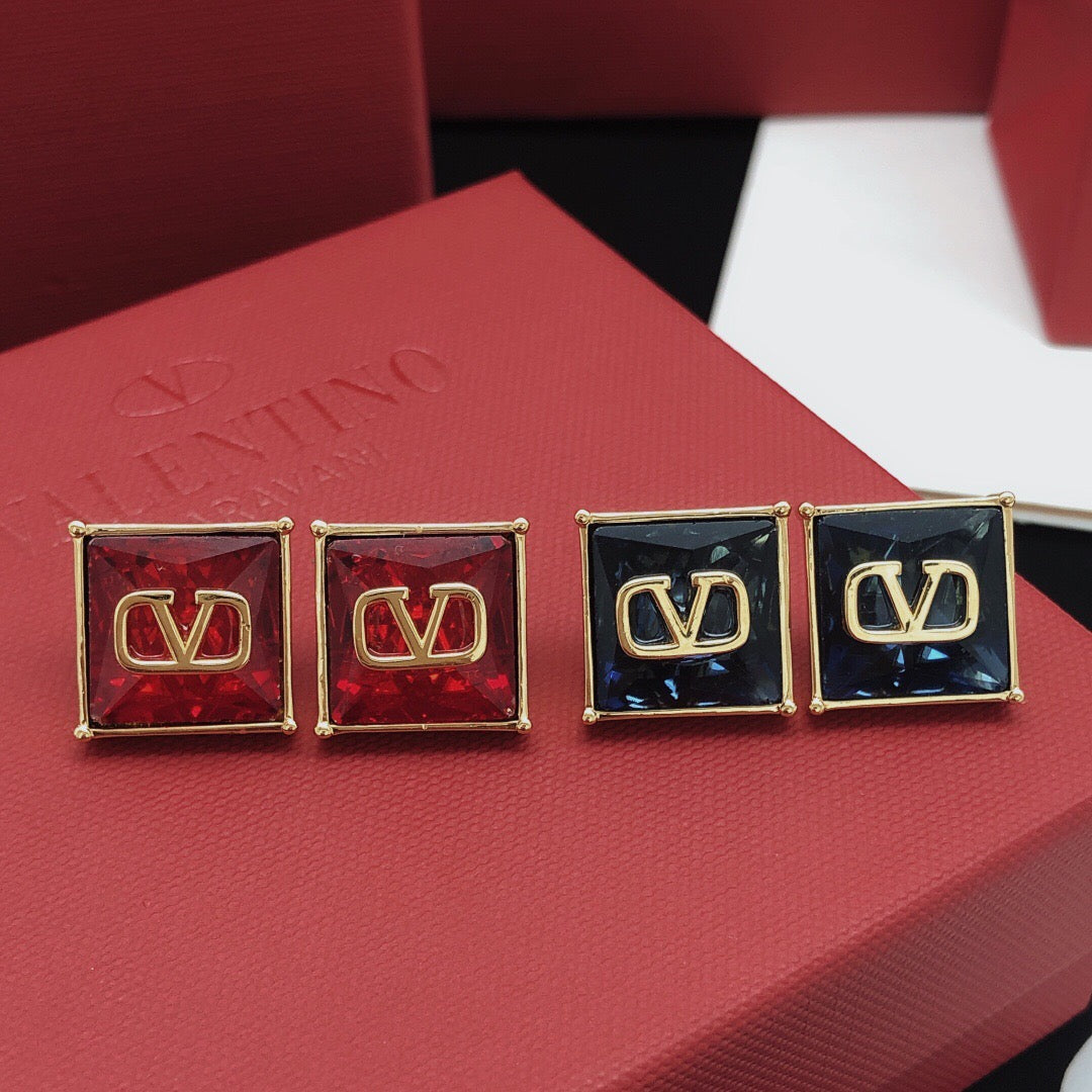 Signature Emblem Stud Earrings in Polished Metal-Tone – Red – Design 02 detail view