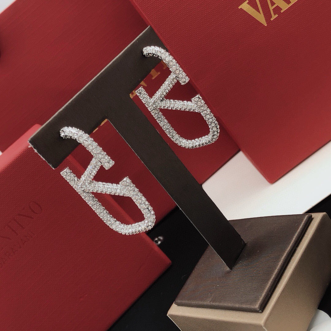 V Emblem Crystal-Accent Stud Earrings – Large styled detail