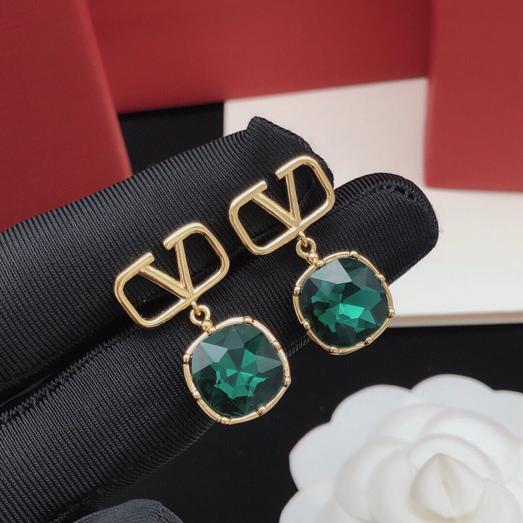 Signature Emblem Crystal-Accent Stud Earrings – Red close-up view