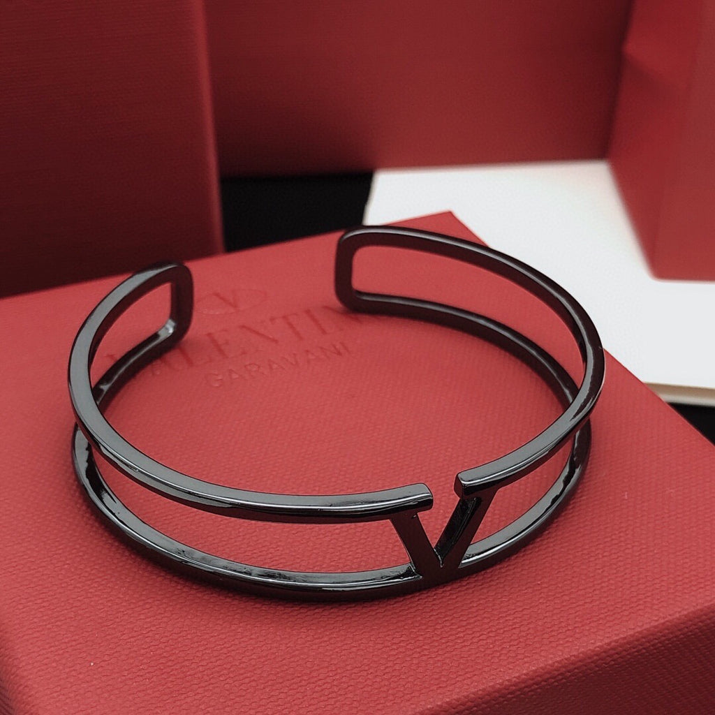 Signature Emblem Cuff Bracelet in Gold-Tone – Black detail view