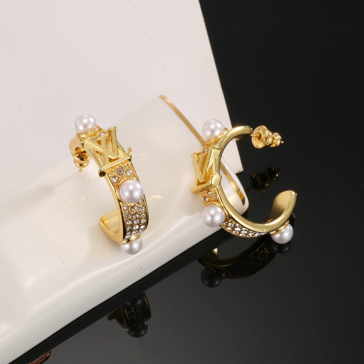 Letter Emblem Stud Earrings in Polished Metal-Tone – Design 039 detail view