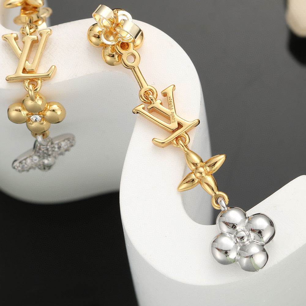 Letter Emblem Stud Earrings in Polished Metal-Tone – Design 027 detail view