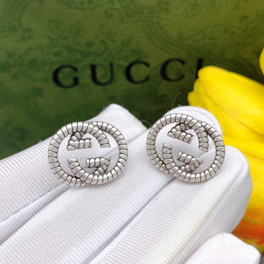 Double-G Emblem Stud Earrings in Silver-Tone – Design 003 detail view