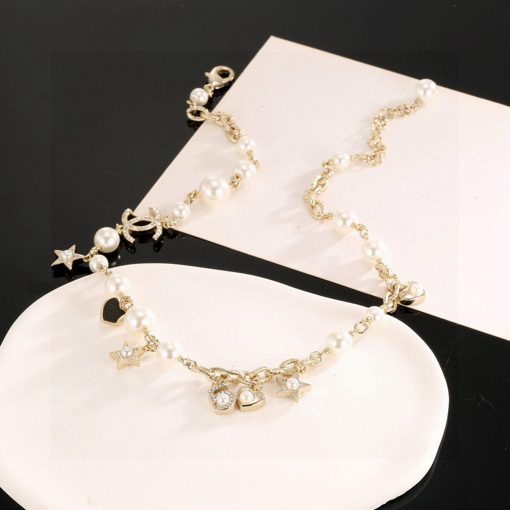 Double-C Emblem Pendant Necklace in Polished Metal-Tone – Star Detail – Design 004 side detail