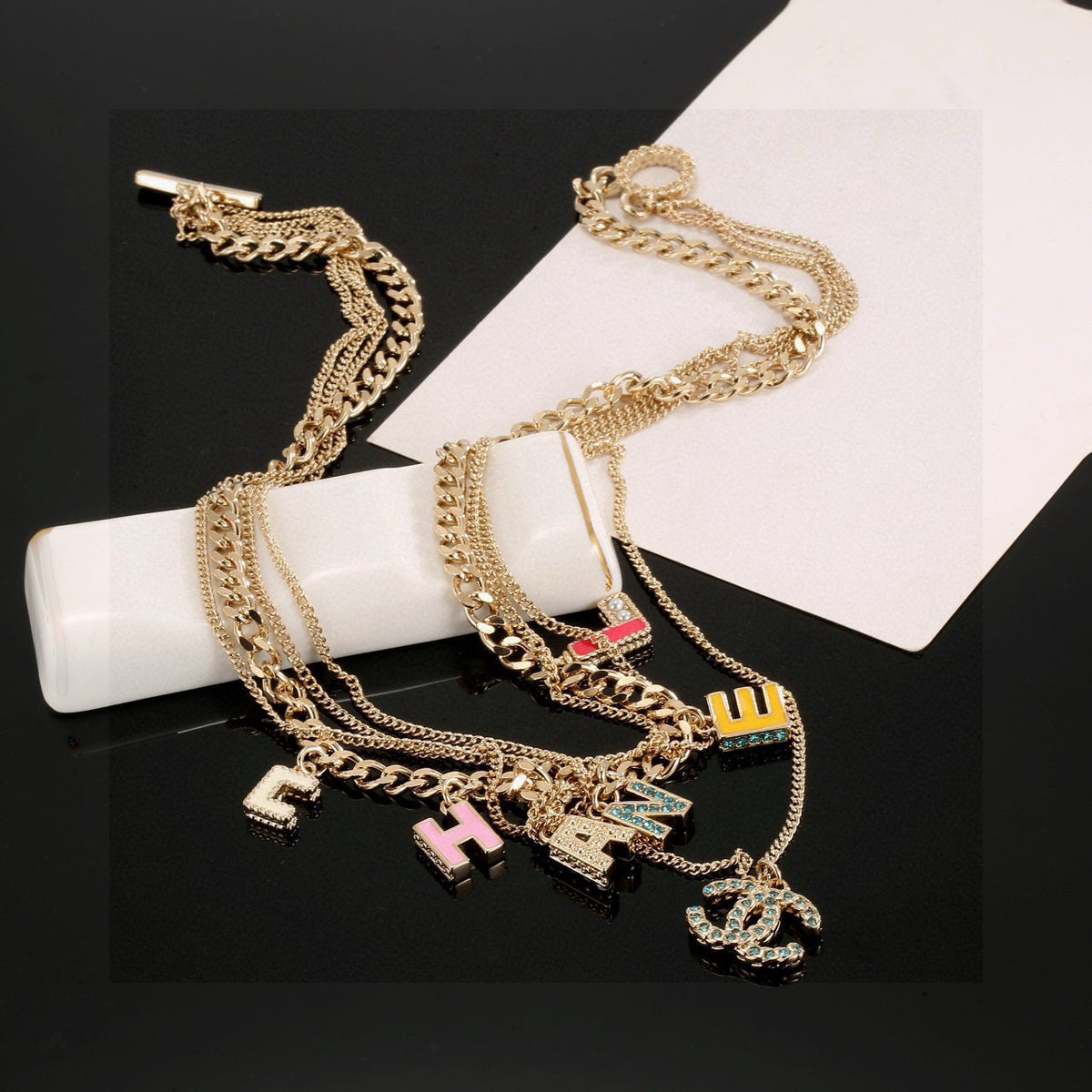 Double-C Emblem Crystal-Accent Pendant Necklace – Design 049 close-up detail