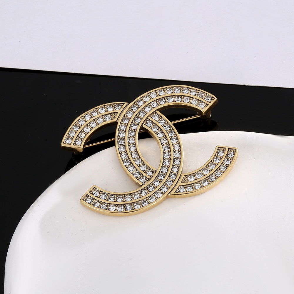 Double-C Emblem Brooch in Gold-Tone – Design 024 styled product view