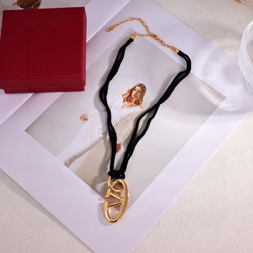 Signature Emblem Pendant Necklace in Polished Metal-Tone – Design 09 close-up view