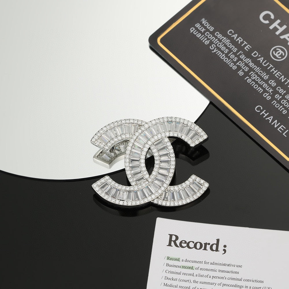 Signature Emblem Brooch in Polished Metal-Tone – Design 056 close-up detail