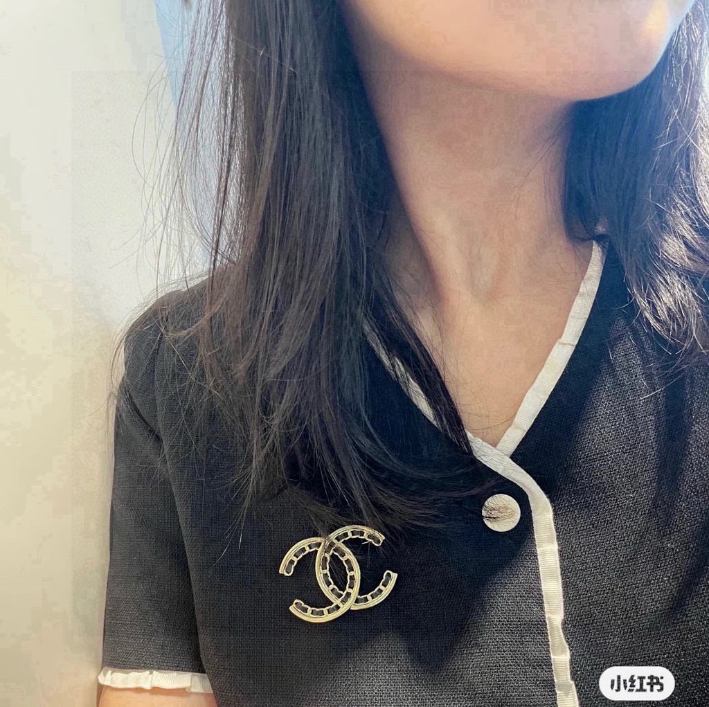 Double-C Emblem Brooch in Polished Metal-Tone – Black Detail main product view