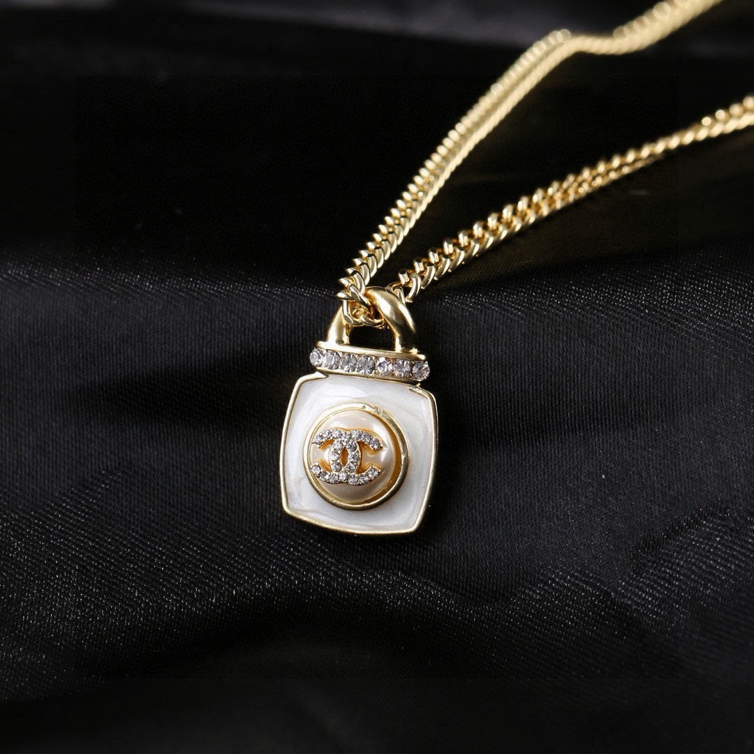 Double-C Emblem Pendant Necklace in Gold-Tone – Design 021 close-up detail