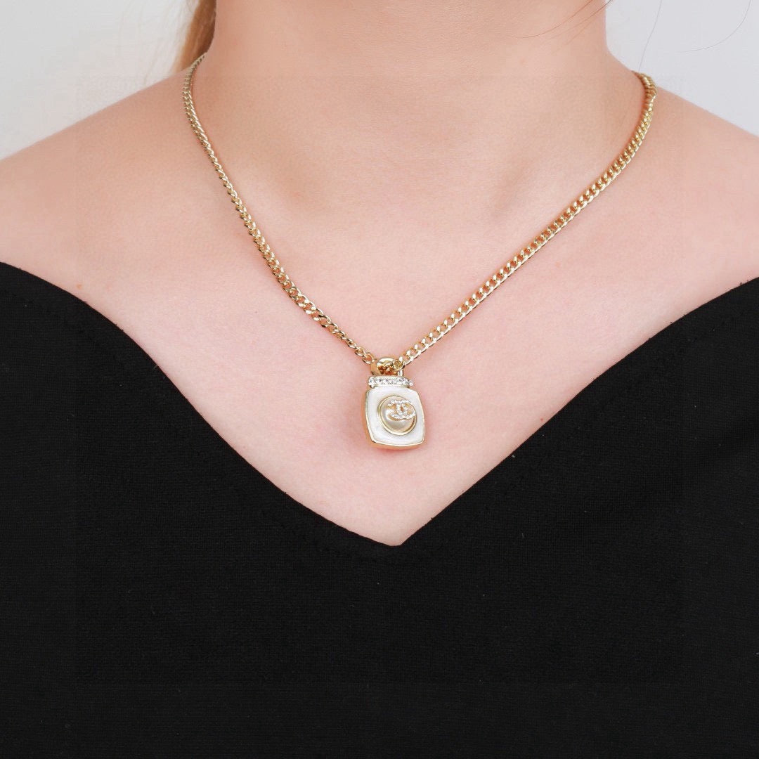Double-C Emblem Pendant Necklace in Gold-Tone – Design 021 styled product view