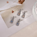 Signature Emblem Stud Earrings in Polished Metal-Tone – Design 112 main product view