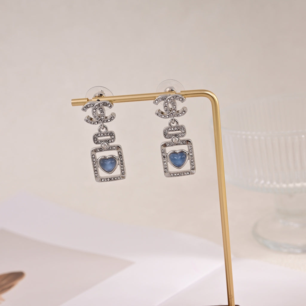 Signature Emblem Stud Earrings in Polished Metal-Tone – Design 112 detail view