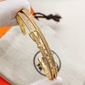 Geometric Emblem Bangle in Gold-Tone – Gold Detail main product view