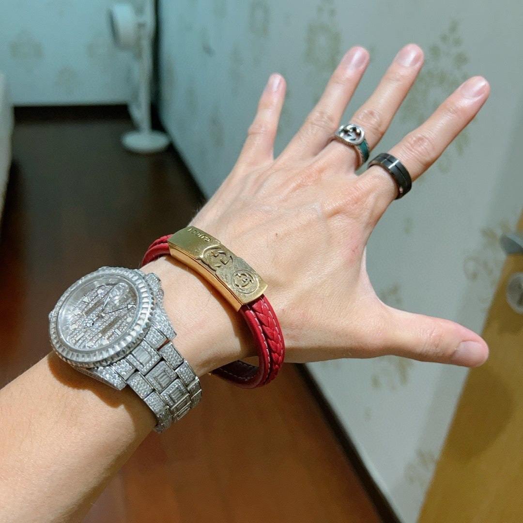 Double-G Emblem Bangle in Polished Metal-Tone – Leather Detail detail view
