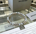 Geometric Emblem Bracelet in Polished Metal-Tone – Pearl Detail main product view