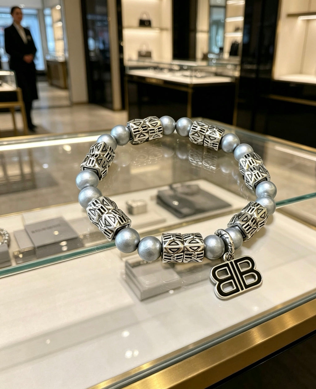 Geometric Emblem Bracelet in Polished Metal-Tone – Pearl Detail front product view