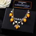 Double-C Emblem Pendant Necklace in Gold-Tone – Design 026 main product view