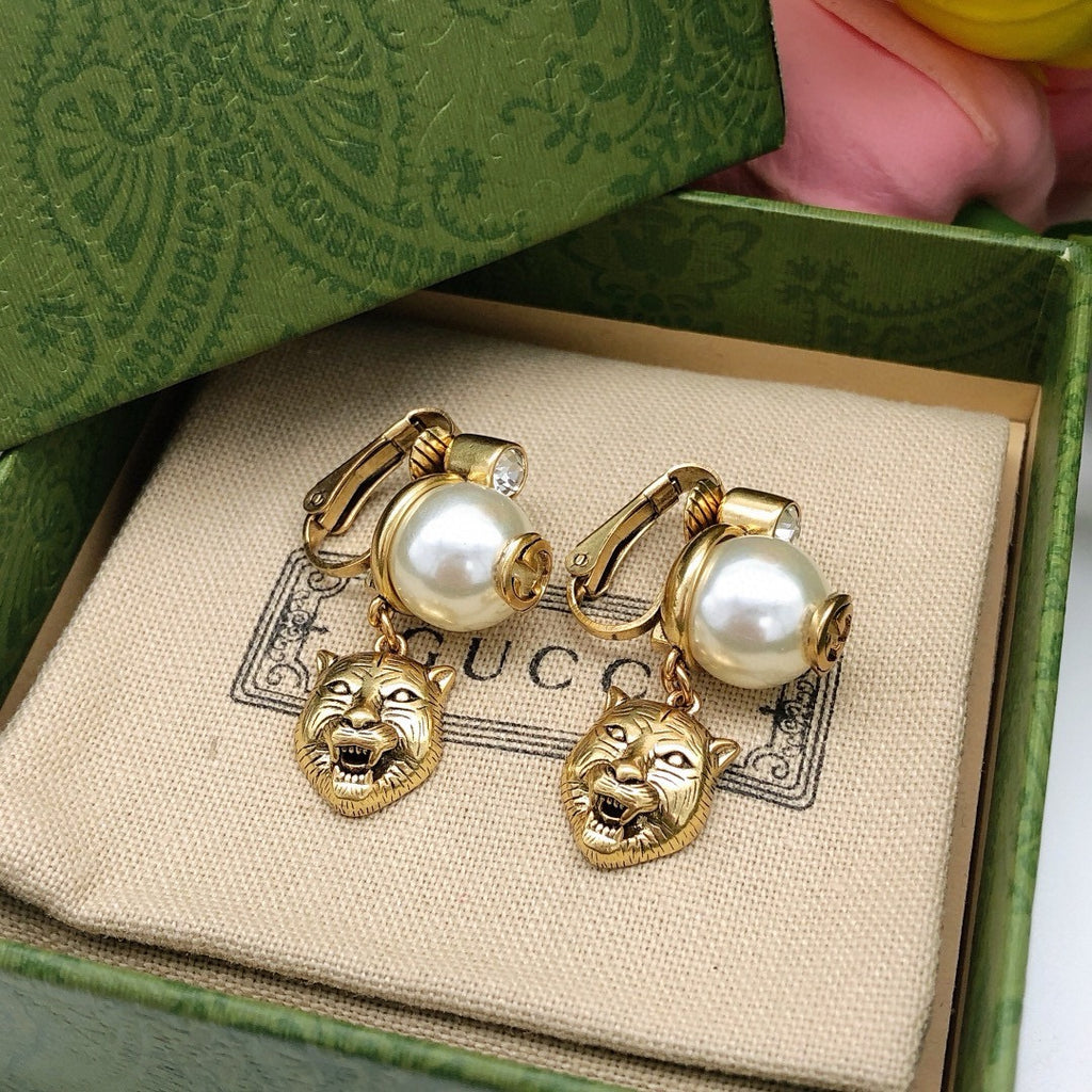 Tiger Head Statement Earrings in Polished Metal-Tone close-up detail