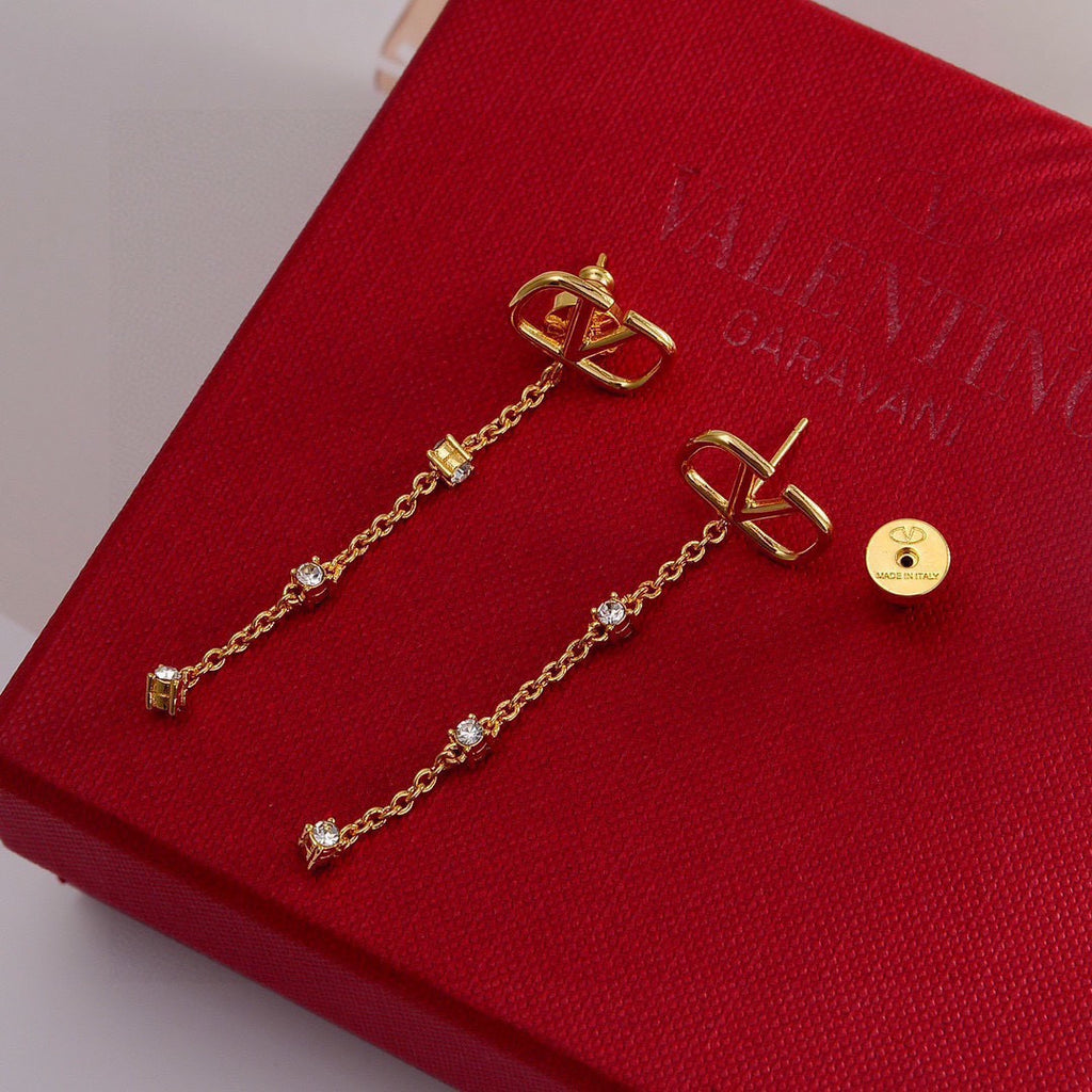 Signature Emblem Stud Earrings in Gold-Tone – Design 23 close-up view