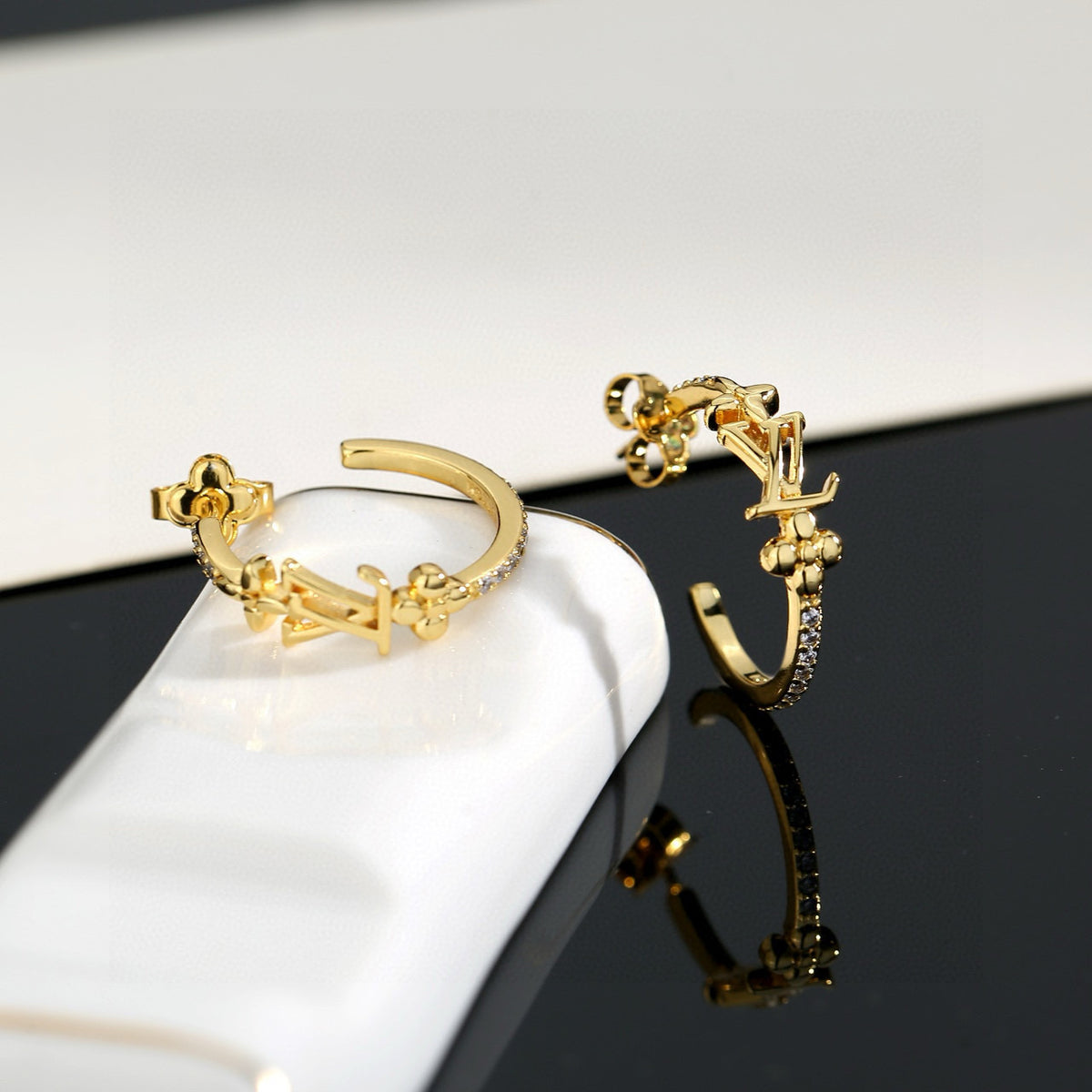 Letter Emblem Stud Earrings in Polished Metal-Tone – Design 044 close-up detail