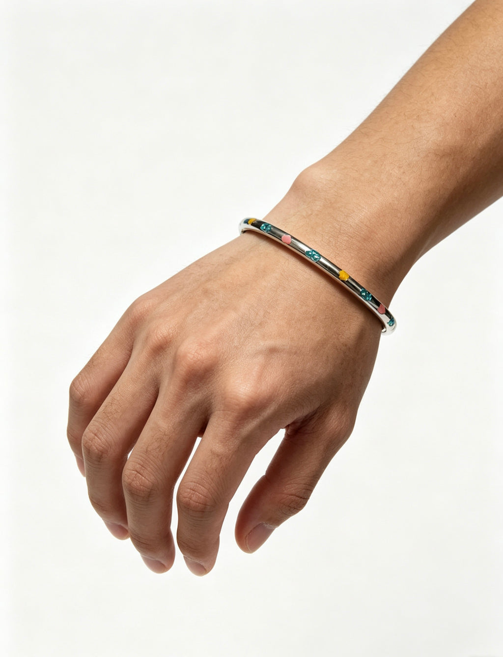 Signature Motif Bangle in Silver-Tone close-up detail