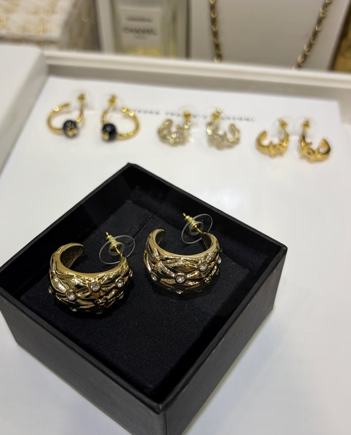 Signature Emblem Stud Earrings in Gold-Tone – Design 081 close-up detail
