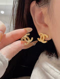 Double-C Emblem Stud Earrings in Gold-Tone – Design 042 main product view