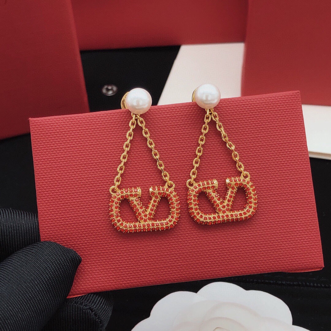 Signature Emblem Crystal-Accent Stud Earrings – Red – Design 02 detail view