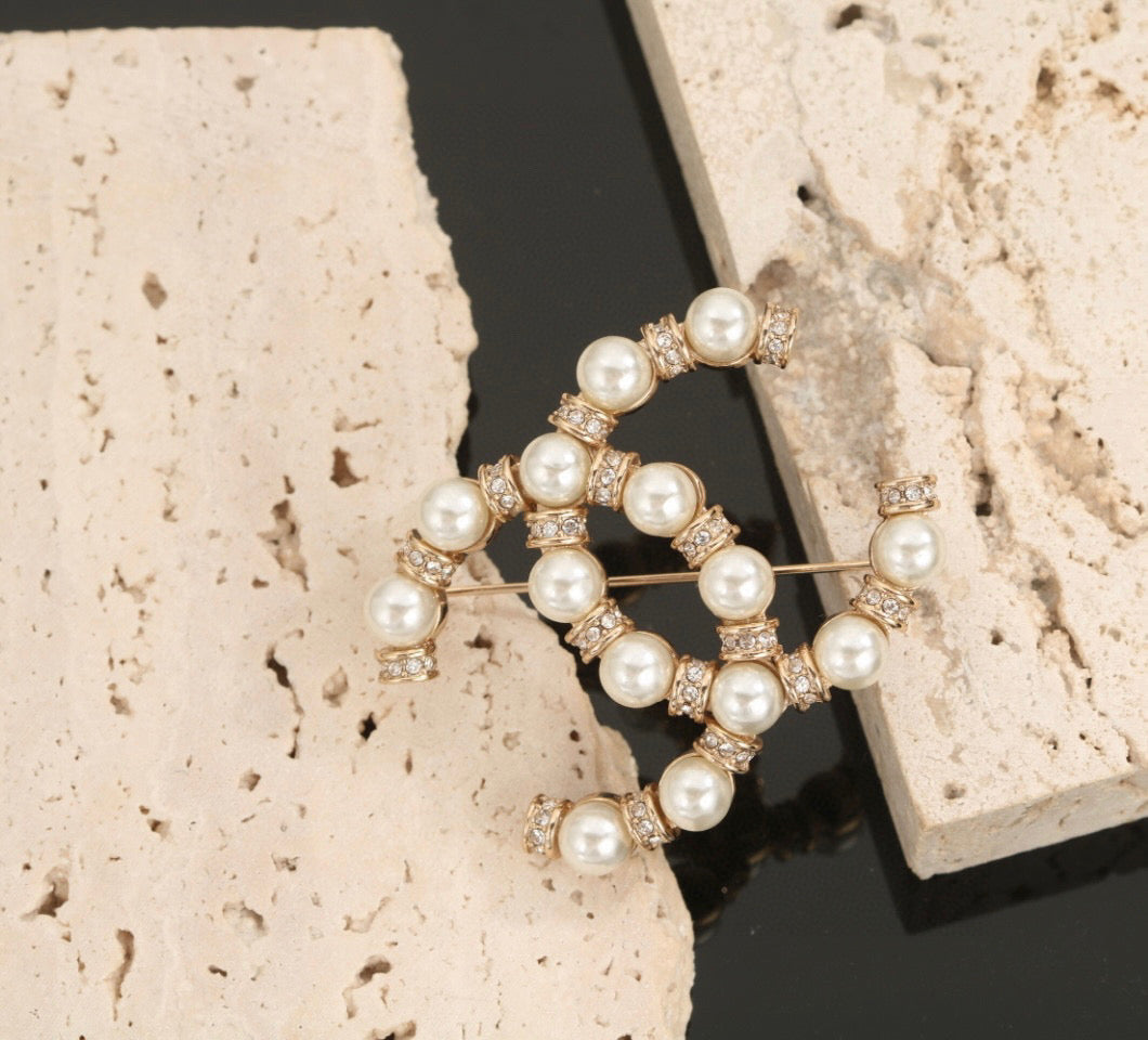 Double-C Emblem Brooch in Polished Metal-Tone – Design 008 detail view