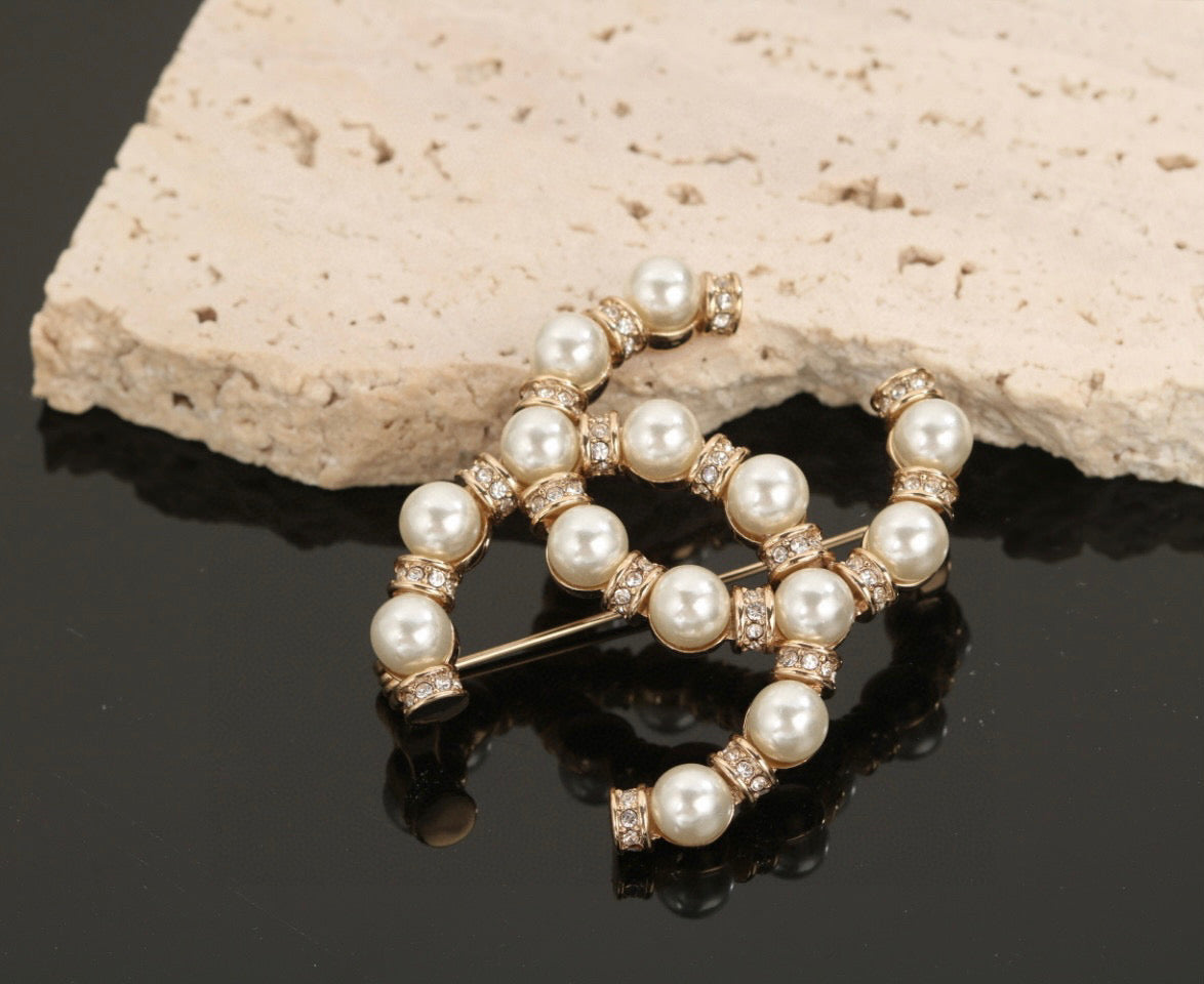 Double-C Emblem Brooch in Polished Metal-Tone – Design 077 styled product view