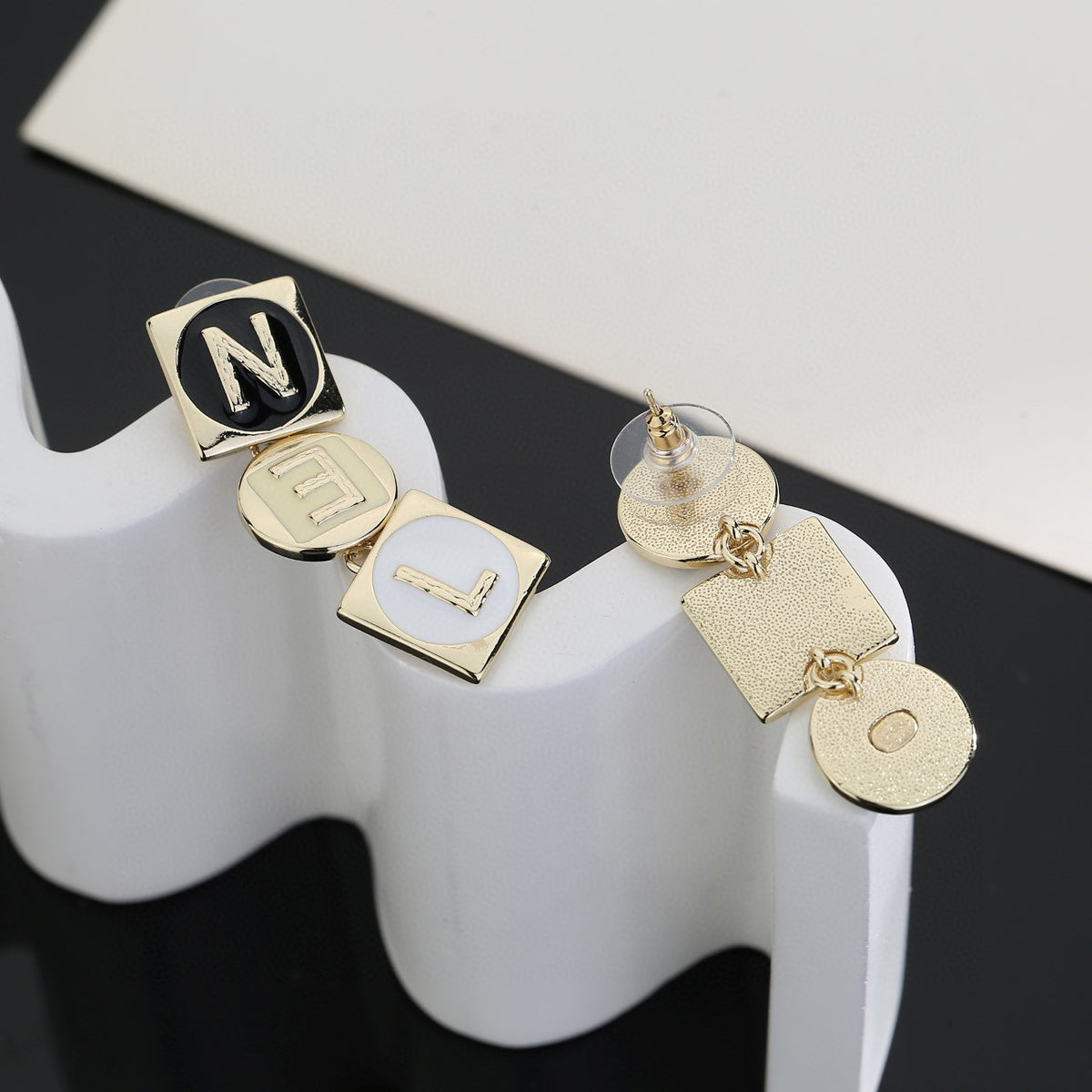 Letter Stud Earrings in Polished Metal-Tone – Design 006 front product view