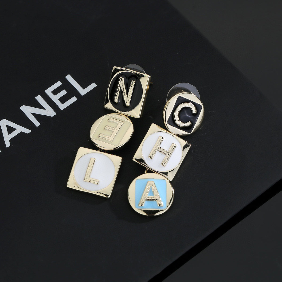 Letter Stud Earrings in Polished Metal-Tone – Design 019 styled product view