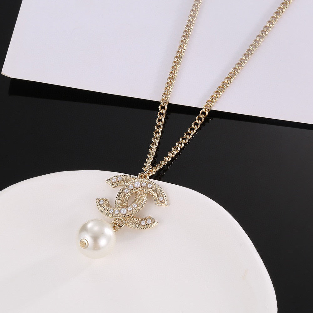 Double-C Emblem Pearl-Detail Pendant Necklace – Pearl Detail – Design 130 front product view