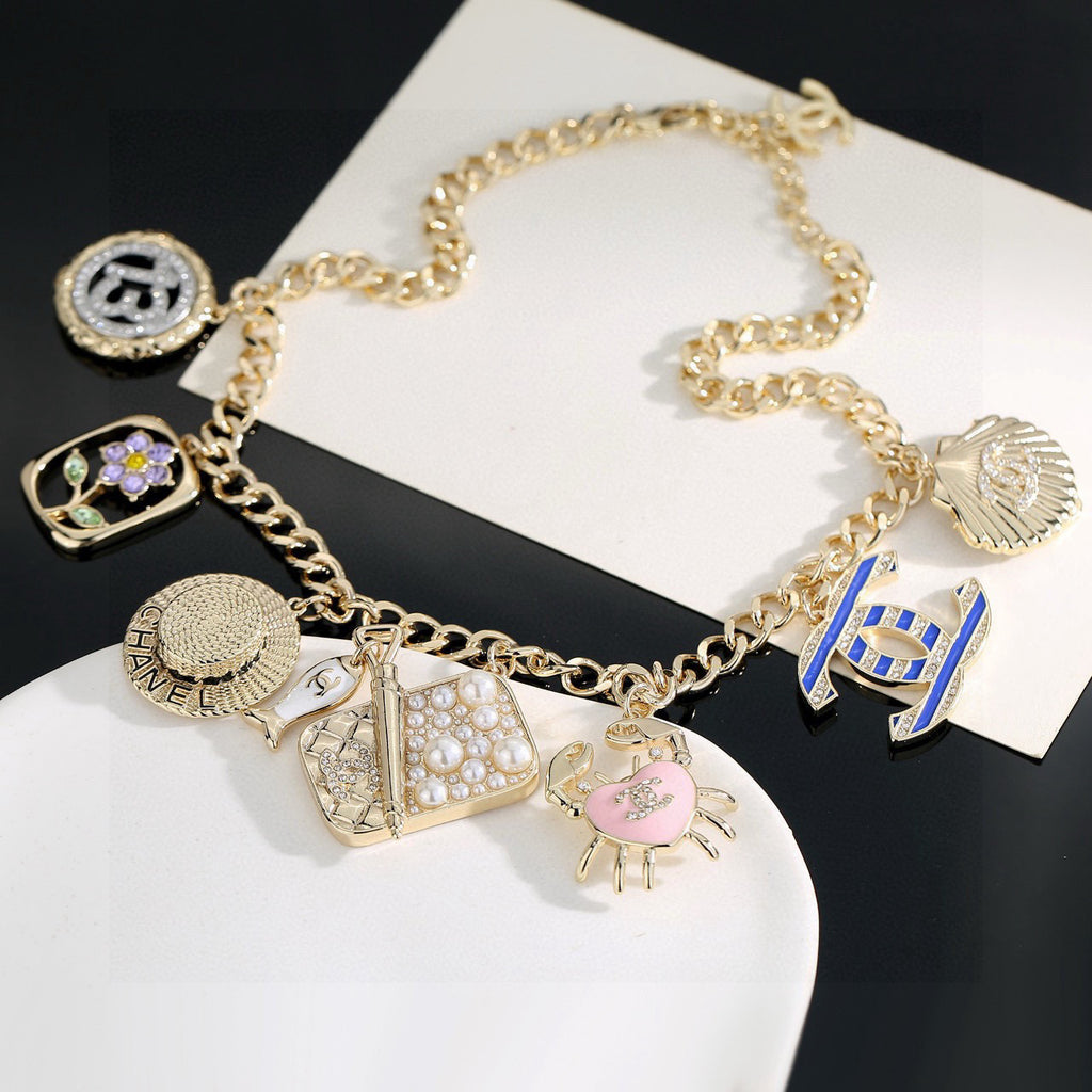 Double-C Emblem Pendant Necklace in Gold-Tone – Shell Detail – Design 002 main product view