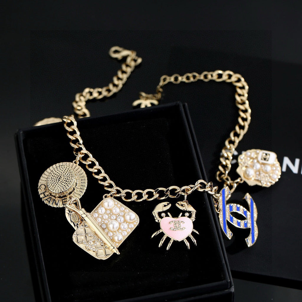 Double-C Emblem Pendant Necklace in Gold-Tone – Shell Detail – Design 002 front product view