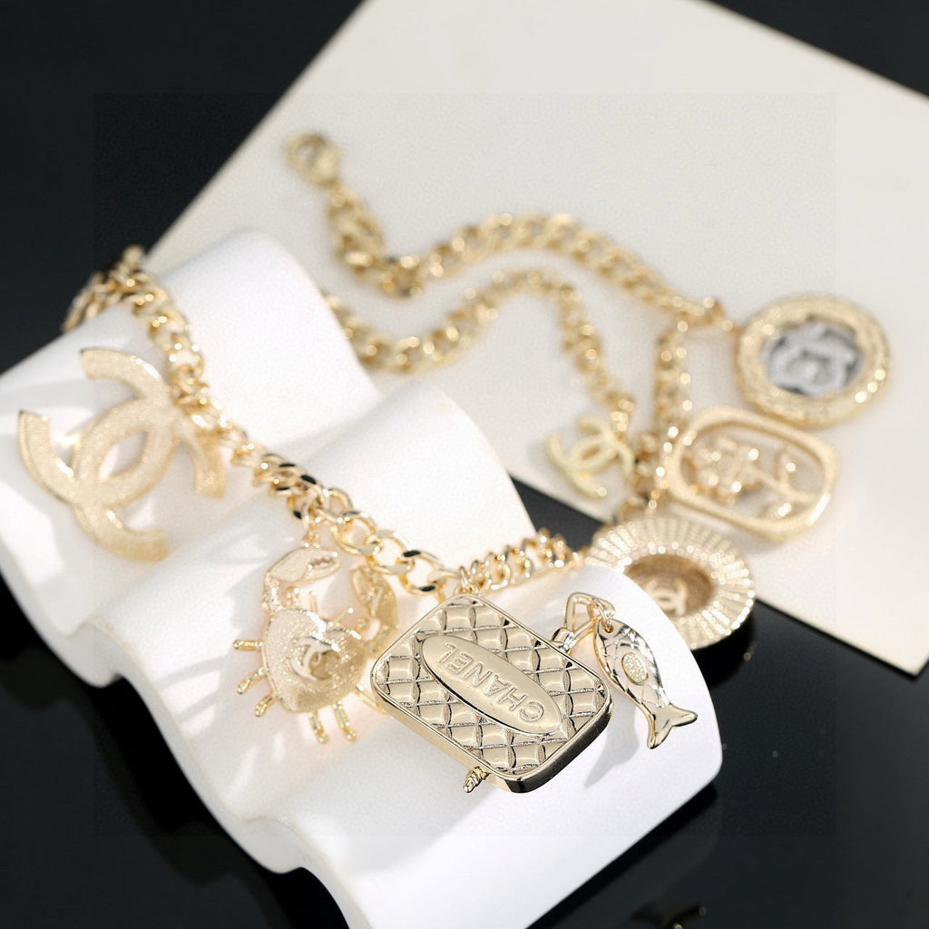 Double-C Emblem Pendant Necklace in Gold-Tone – Shell Detail side detail