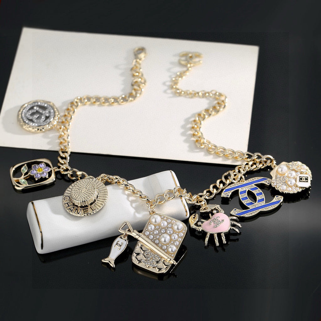 Double-C Emblem Pendant Necklace in Gold-Tone – Shell Detail – Design 002 styled product view