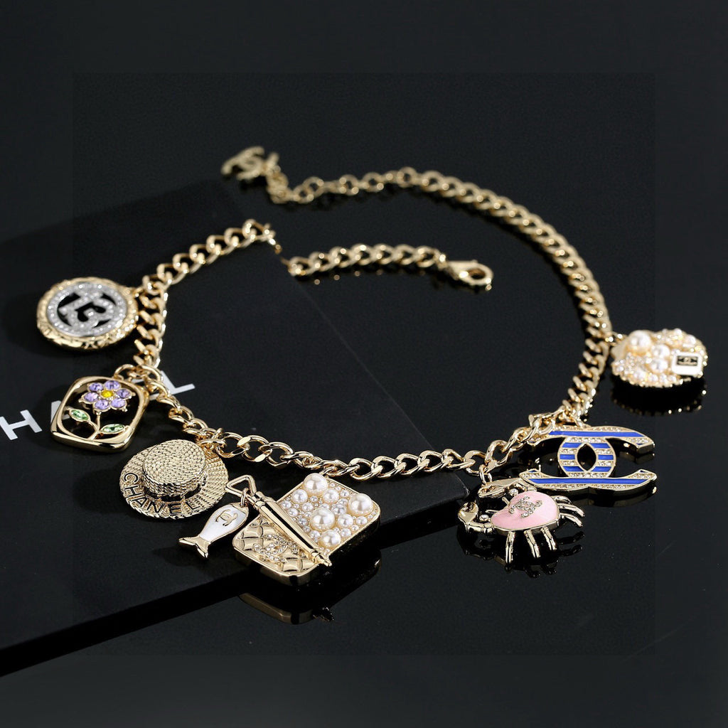 Double-C Emblem Pendant Necklace in Gold-Tone – Shell Detail – Design 002 main product view