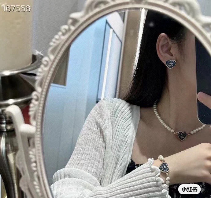 Double-C Emblem Bracelet in Polished Metal-Tone – Pearl Detail – Design 003 styled product view