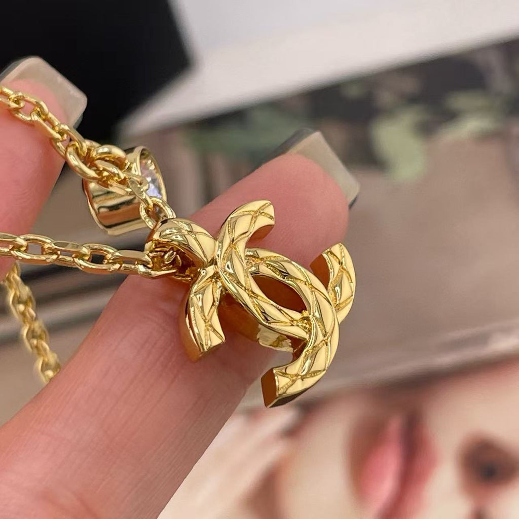 Double-C Emblem Pendant Necklace in Gold-Tone – Design 022 detail view