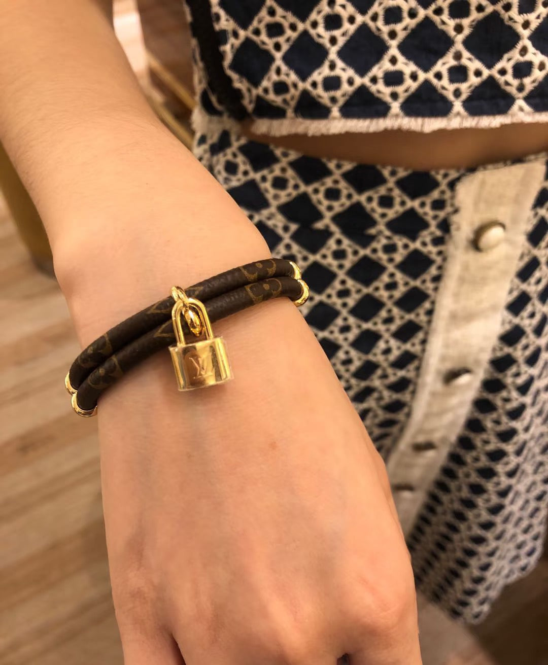 Letter Emblem Bangle in Polished Metal-Tone – Leather Detail – Design 002 front product view